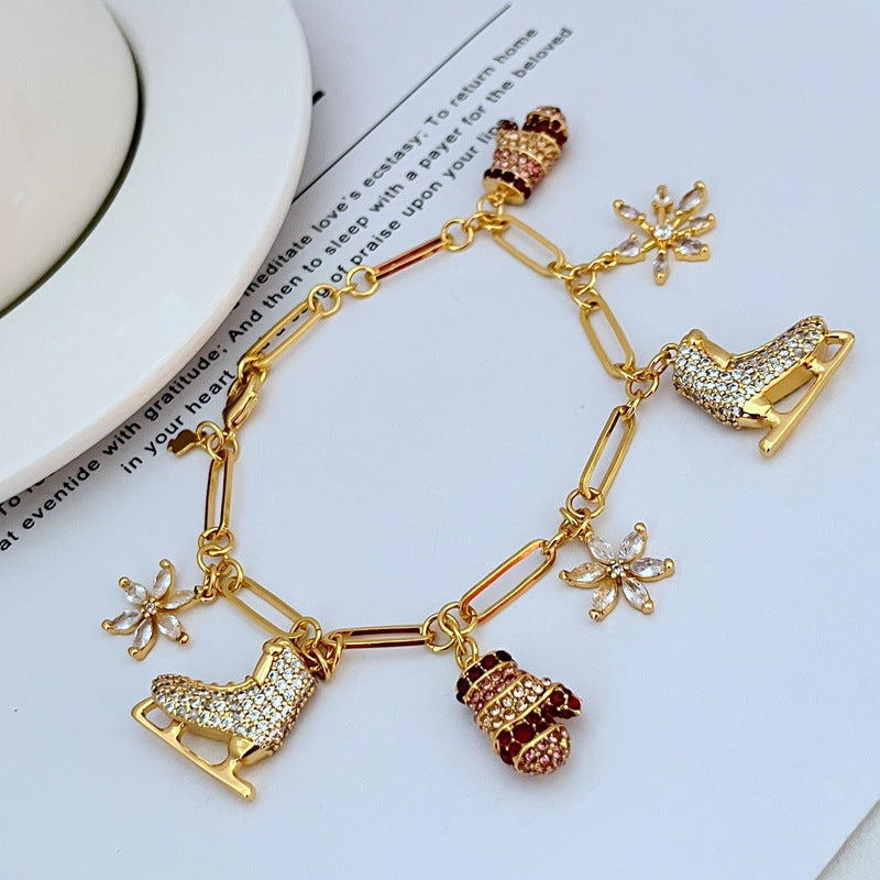 Kate Spade Snowflake Ice Skates Gloves Pendant Bracelet Frozen Romance