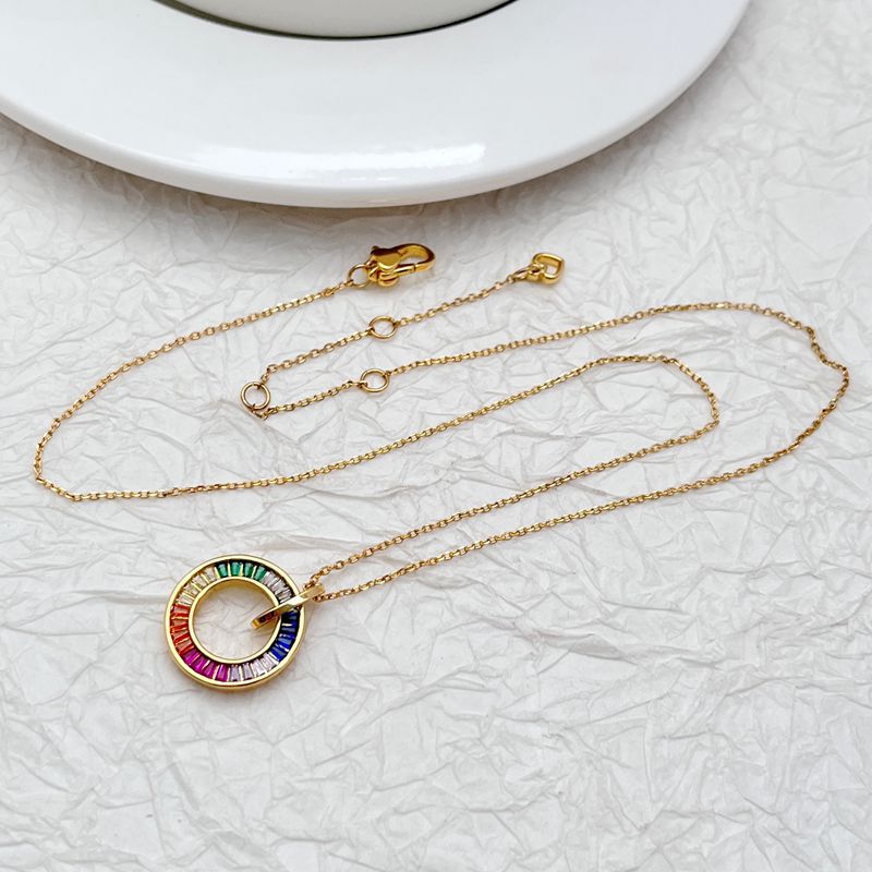 Gold-tone zircon donut pendant necklace with rainbow multicolor rings on chain