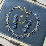 Blue rhinestone heart necklace with matching heart bracelet and ring charms