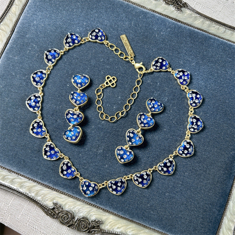 Blue rhinestone heart necklace with matching heart bracelet and ring charms