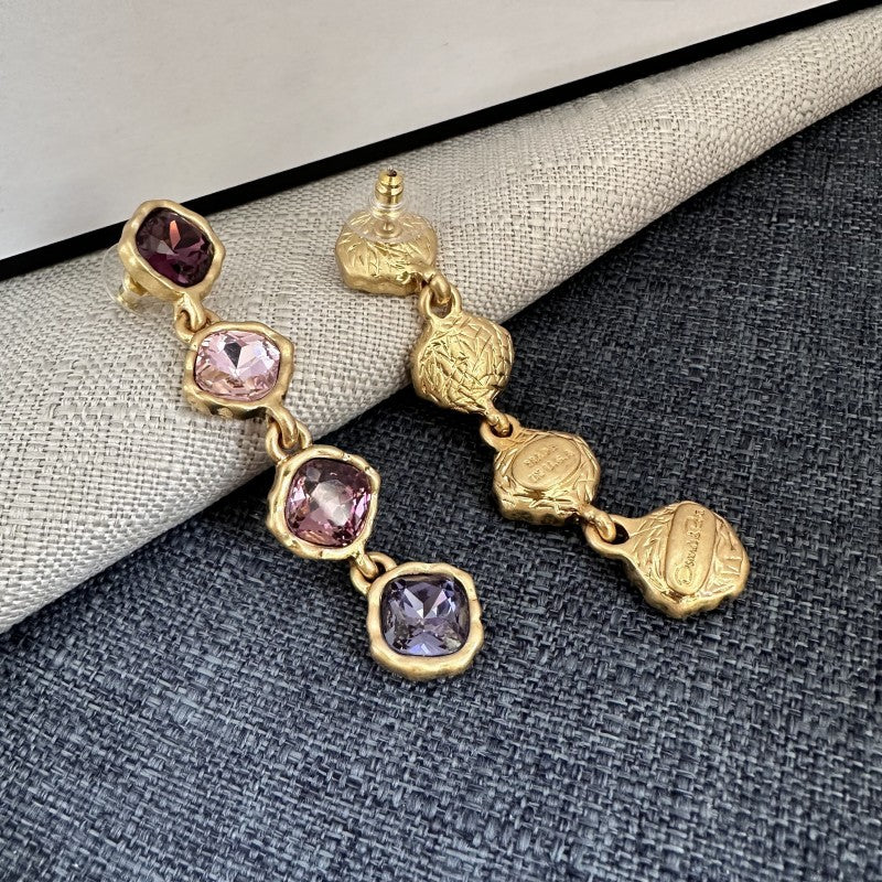 Full-crystal square drop earrings with purple and lilac stones on gold-tone links