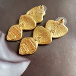 Hand-painted enamel leaf pendant earrings, gold heart leaves with textured finish