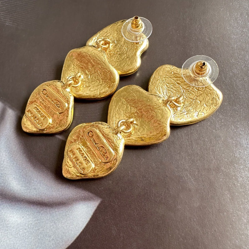Hand-painted enamel leaf pendant earrings, gold heart leaves with textured finish