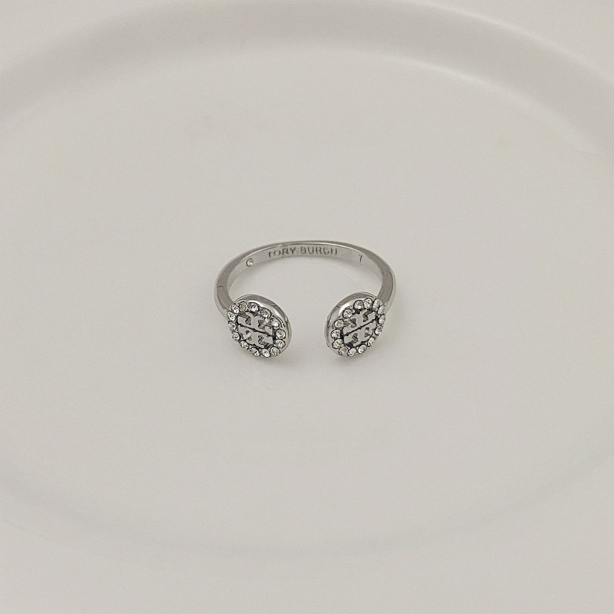 Tory Burch rhinestone round logo ring, white gold-tone with crystal logo faces