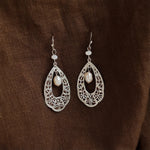 White gold filigree teardrop earrings with freshwater pearl drop detailing