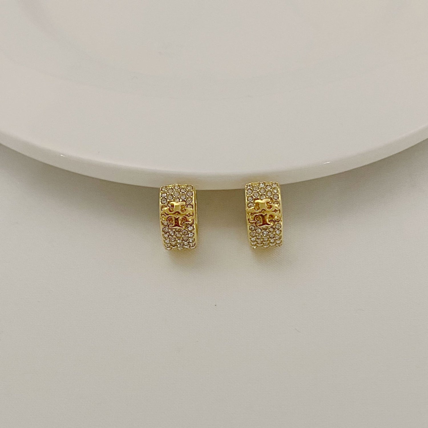 Gold-tone logo earrings with crystal pavé hoop, square top design