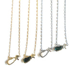 Layered charm necklace set with gold and silver-tone chains and golf-bag pendants