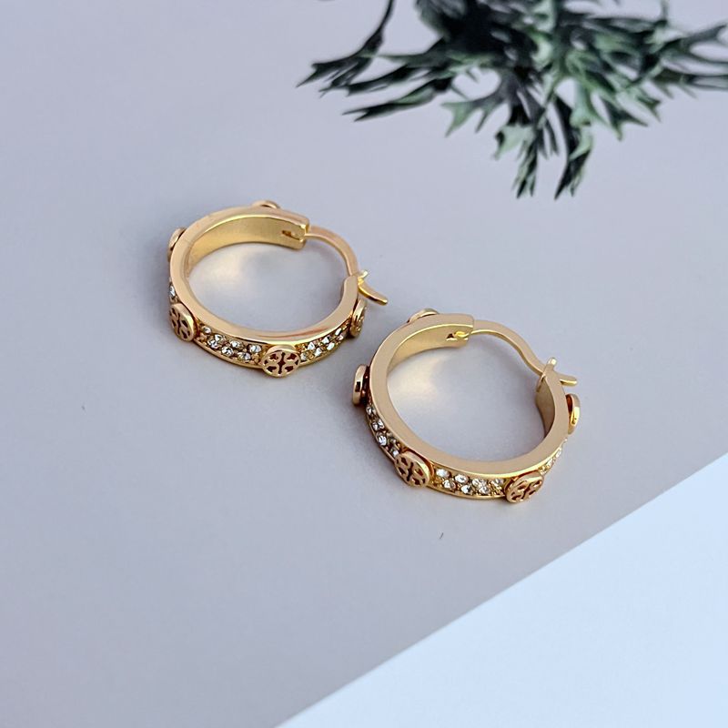 Gold round logo hoop earrings with pavé stones and scalloped edges