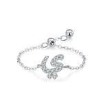 Sterling silver adjustable chain bracelet with Arabic letter charm in clear stones, rounded shape
