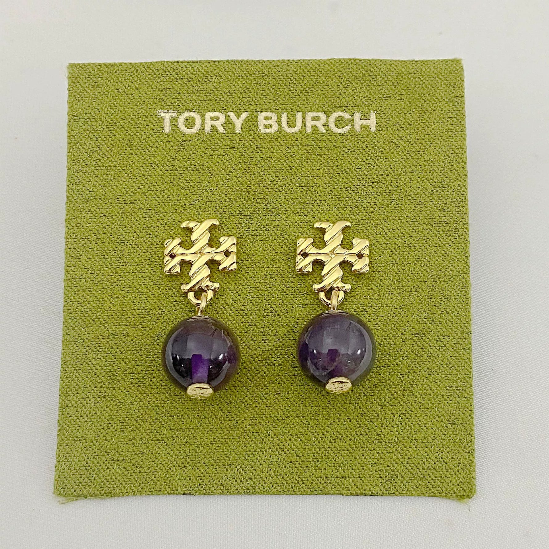 Purple round agate pendant earrings with gold-tone geometric drop details
