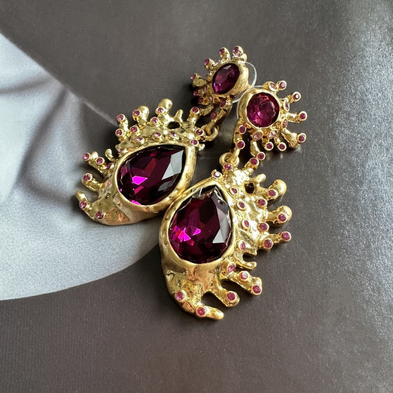 Cactus crystal dangle earrings with faceted magenta teardrop stones and ruby-like accents