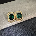 Square crystal stud earrings: emerald-green square stones in gold-tone frames