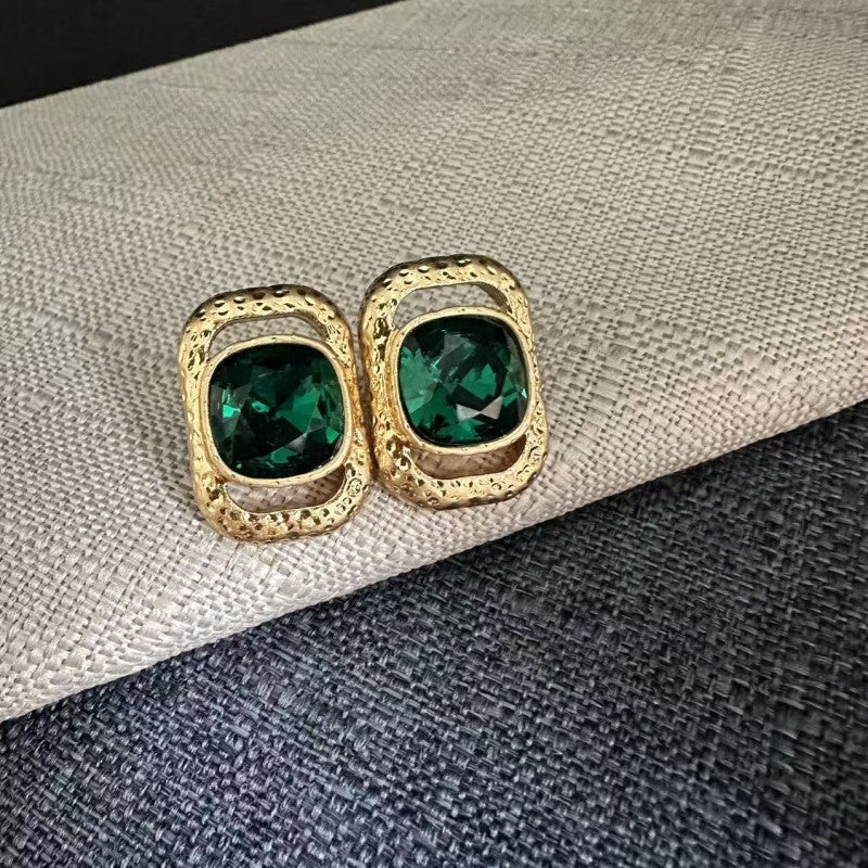 Square crystal stud earrings: emerald-green square stones in gold-tone frames