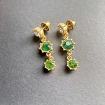 Gold-tone round crystal drop earrings with dark green and light green dangling stones