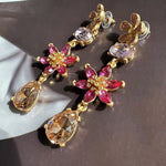 Pink floral crystal drop earrings with amber and clear pear teardrop accents
