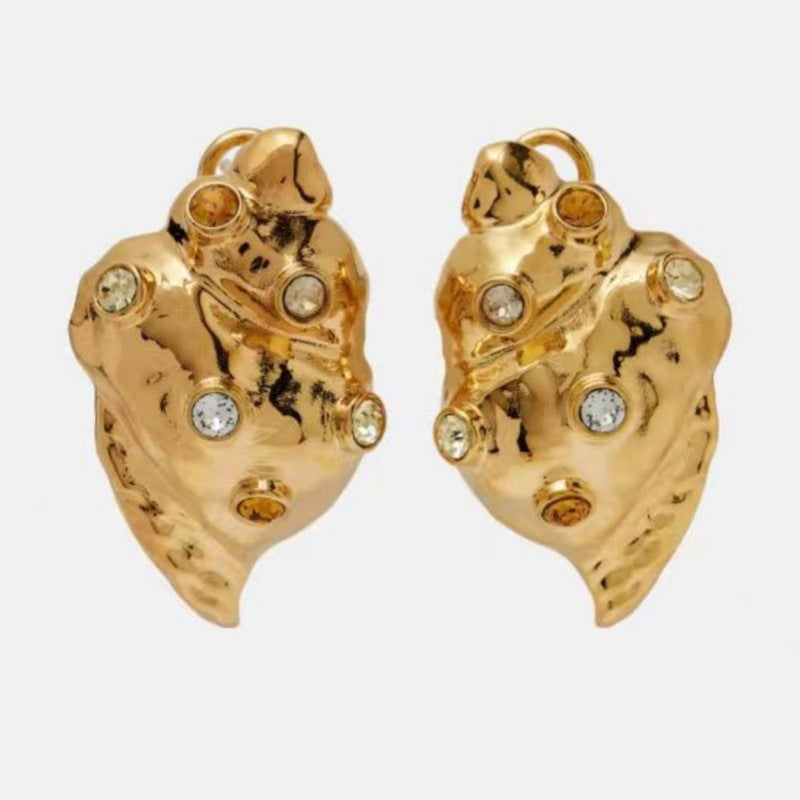 Conch earrings, gold tone, back view with clear stones and posts