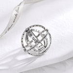 Silver transformable magic ring with celestial engraved sphere and star motifs