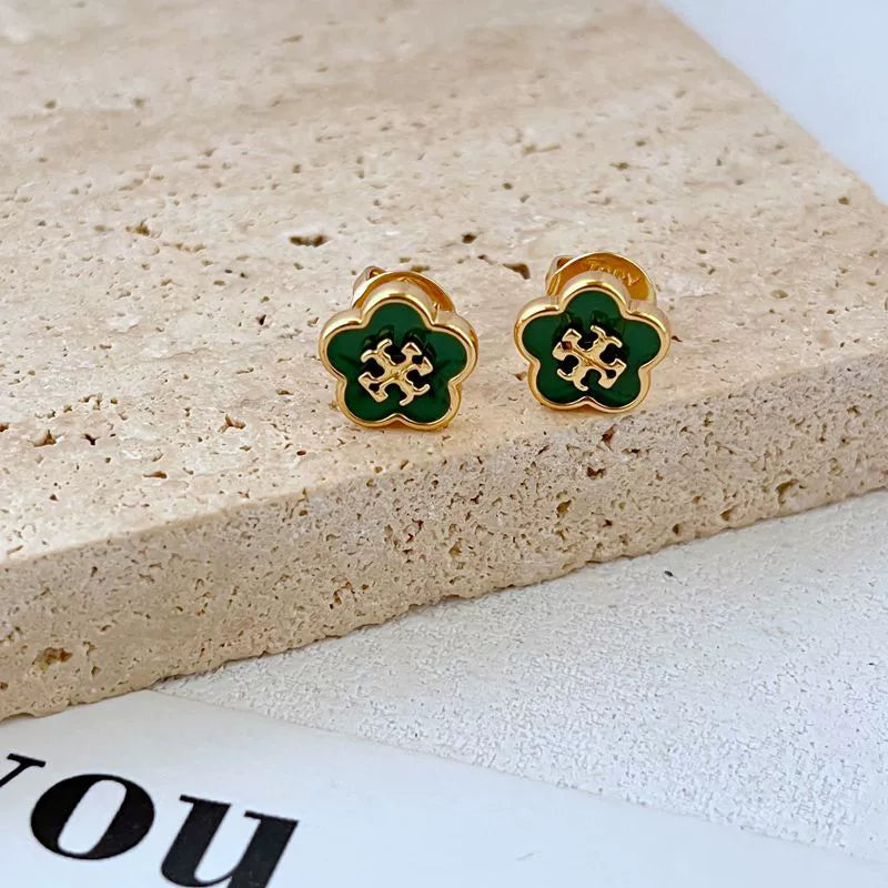 Candy-colored enamel flower stud earrings, gold-tone with green petals and red motif