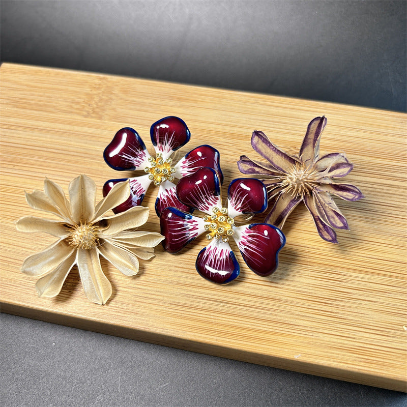 Cherry blossom enamel stud earrings, purple gradient petals with white detailing