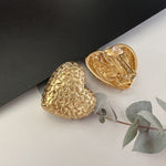 Gold textured heart clip-on earrings, flat back with clip mechanism
