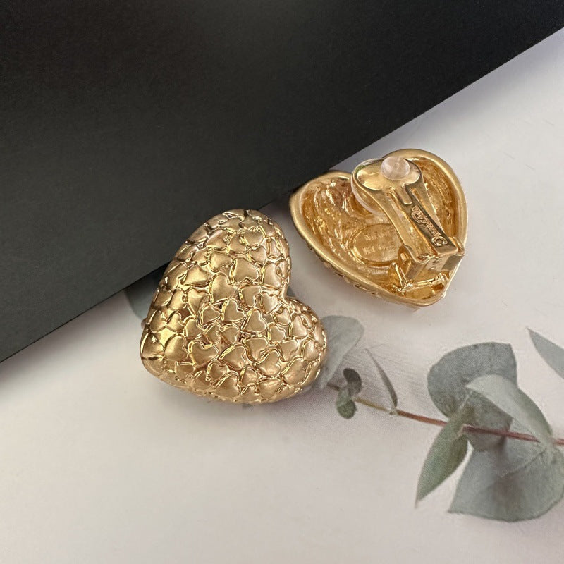 Gold textured heart clip-on earrings, flat back with clip mechanism
