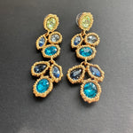 Long blue crystal drop earrings, gold-tone ornate clusters
