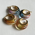 Set of ombré resin U-shaped hoop earrings, gold-tone with blue, purple, and orange gradients