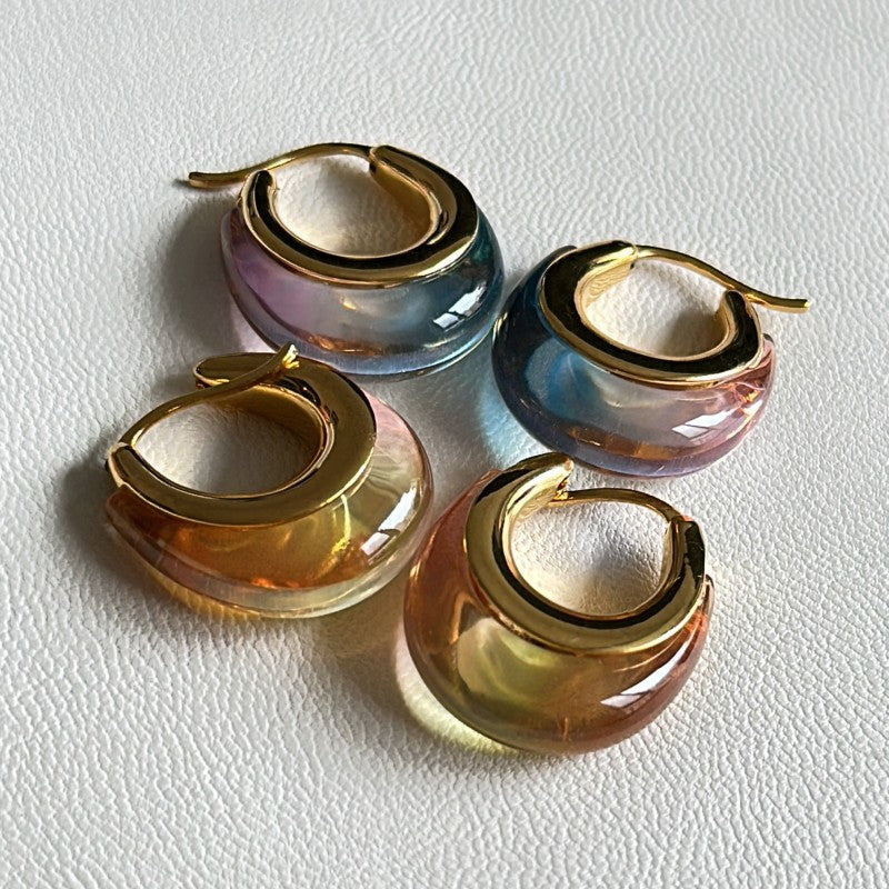 Set of ombré resin U-shaped hoop earrings, gold-tone with blue, purple, and orange gradients