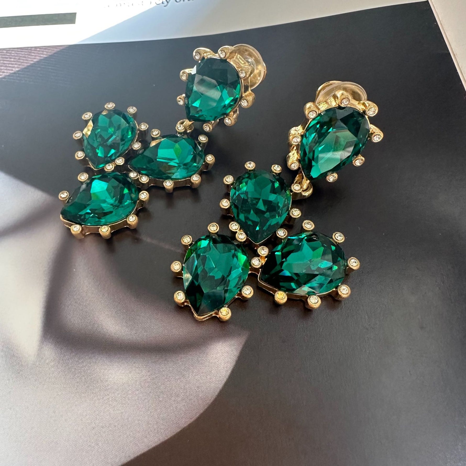 Cactus-cut sparkling glass diamond ear clips in deep green with gold-tone settings