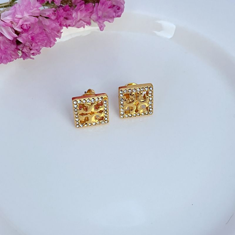 Gold square rhinestone openwork stud earrings with ornate cutout design