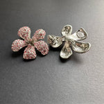 Large flower stud earrings with pink crystal rhinestone petals, silver-tone posts