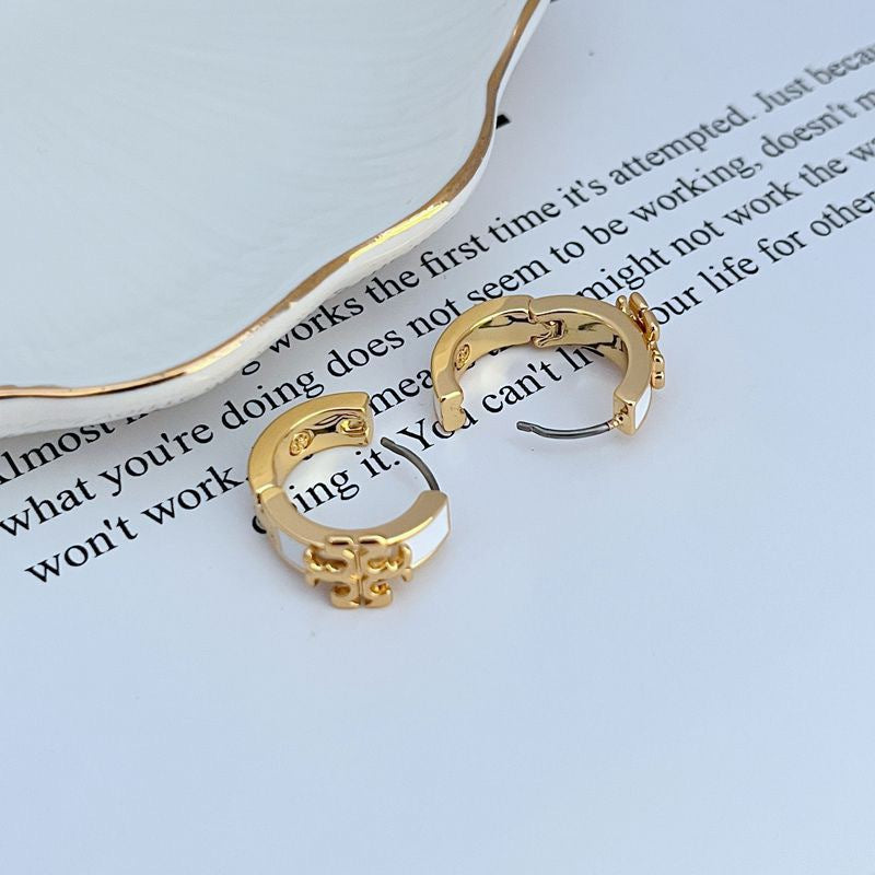 Enamel logo metal hoop earrings, pink inlay, gold-tone clasp detail