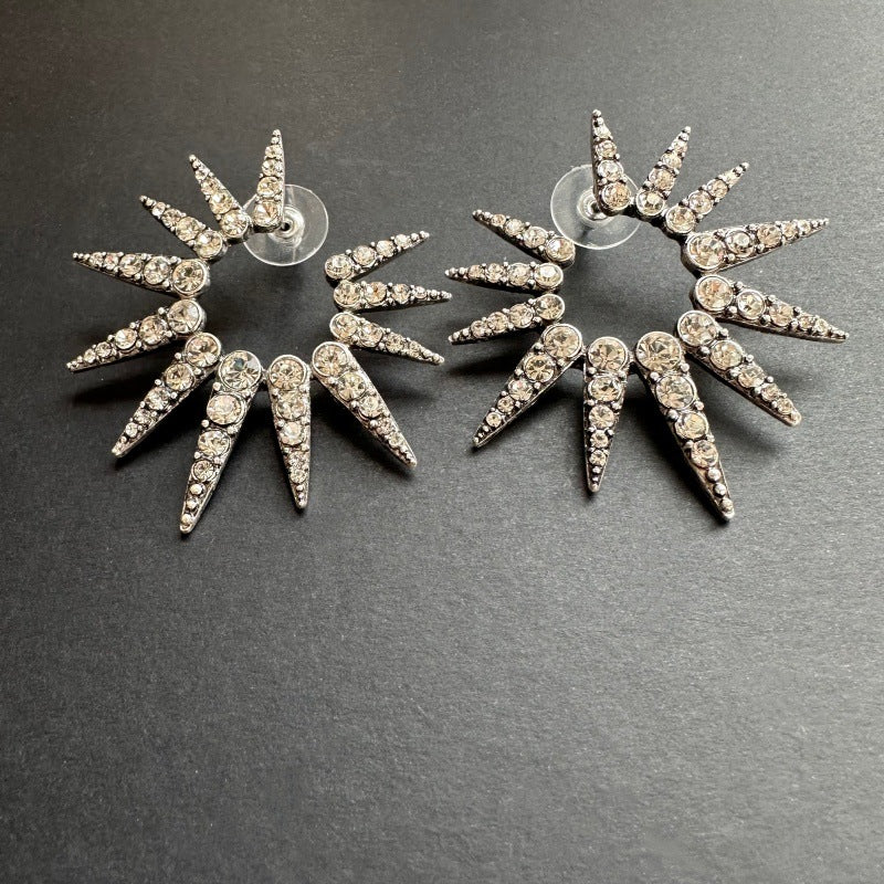 Silver White diamond starburst sunflower earrings with clear rhinestones and silver-tone posts
