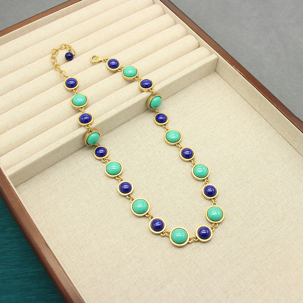 Vintage beaded necklace with gold-tone links, green and blue oval stones