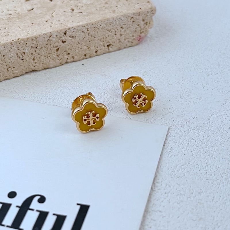 Candy-colored enamel flower stud earrings, gold-tone with yellow petals and red motif