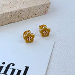 Candy-colored enamel flower stud earrings, gold-tone with yellow petals and red motif