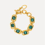Square crystal toggle bracelet with emerald-green stones and gold links