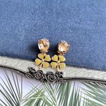 Vintage four-leaf clover earrings with champagne oval stones and yellow-gold pavé clover petals