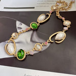 O-ring glass pearl necklace, green and pink oval stones with white pearls, gold tone
