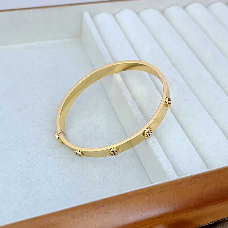 Tory Burch Embossed Logo Polished Bangle