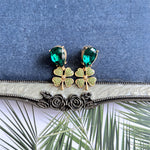 Vintage four-leaf clover earrings with emerald-green teardrop stones and green pavé clovers