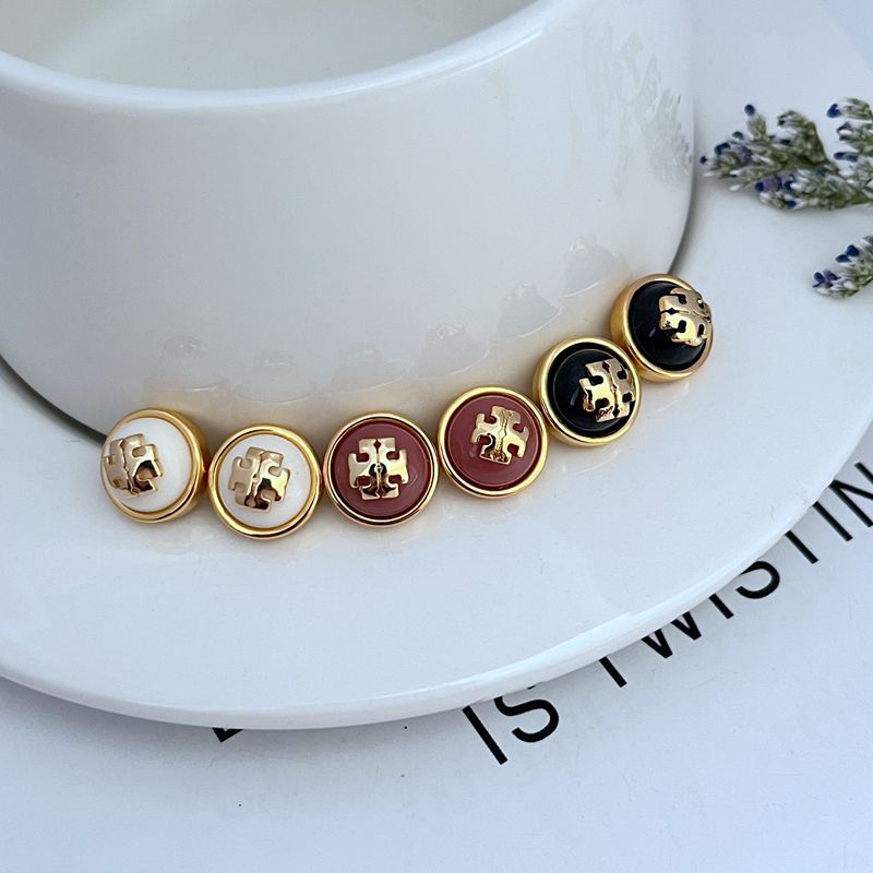 Round resin logo stud earrings, mixed white burgundy and black with gold-tone frames