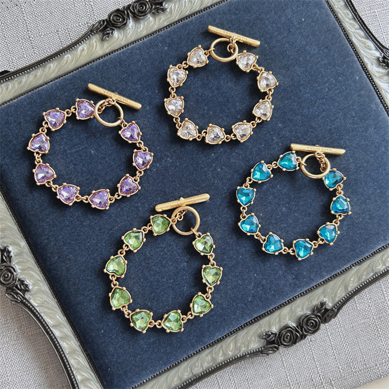 Sparkling crystal heart bracelets with gold-tone chain and heart-shaped stones