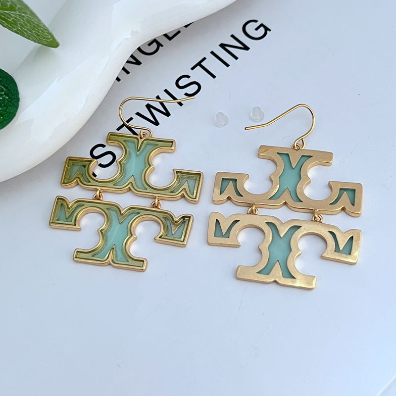Teal-green logo drop earrings with gold-tone metal hooks