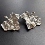 Silver-tone ivy leaf pearl earrings with textured leaf detailing and round faux pearls