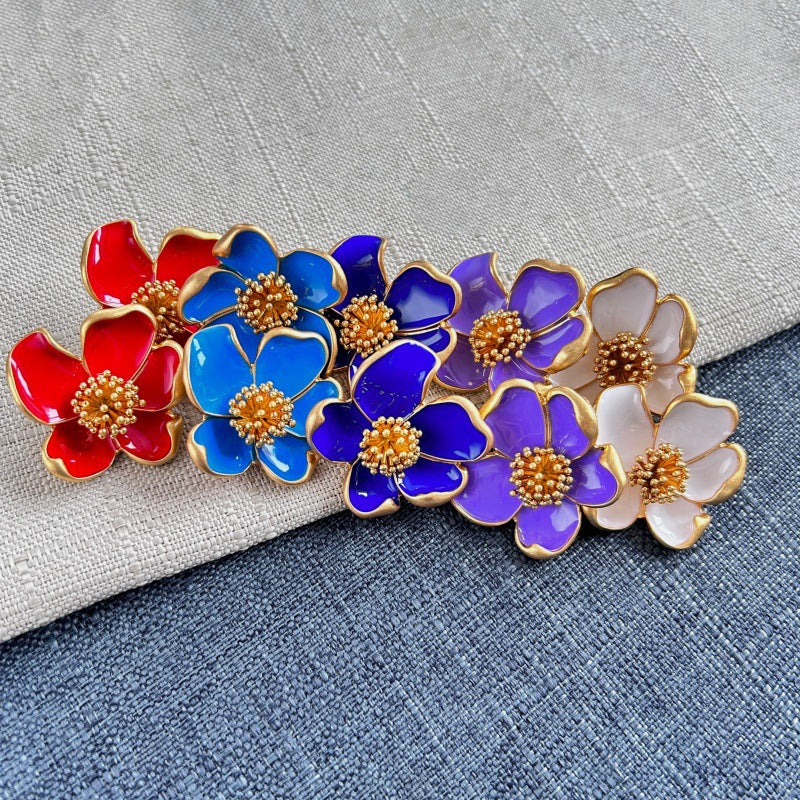 Enamel floral stud earrings mix: red, deep blue, purple, and white petals with gold-tone