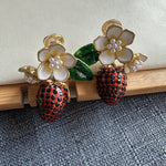 Clip-on strawberry & enamel flower earrings, faux pearl centers, gold-tone mounts.