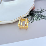 Polished gold wide openwork ring with square frame and heart cutout center