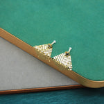 Gold sequin scarf-style drop earrings with small tassel bead tops