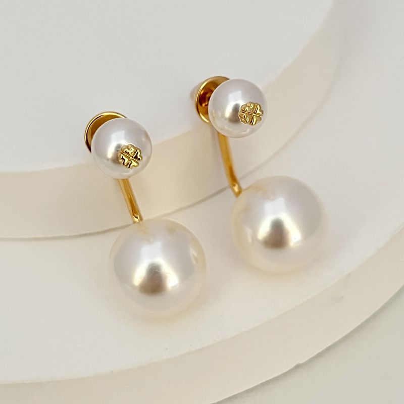 Gold-tone pearl drop earrings with large and small white pearls